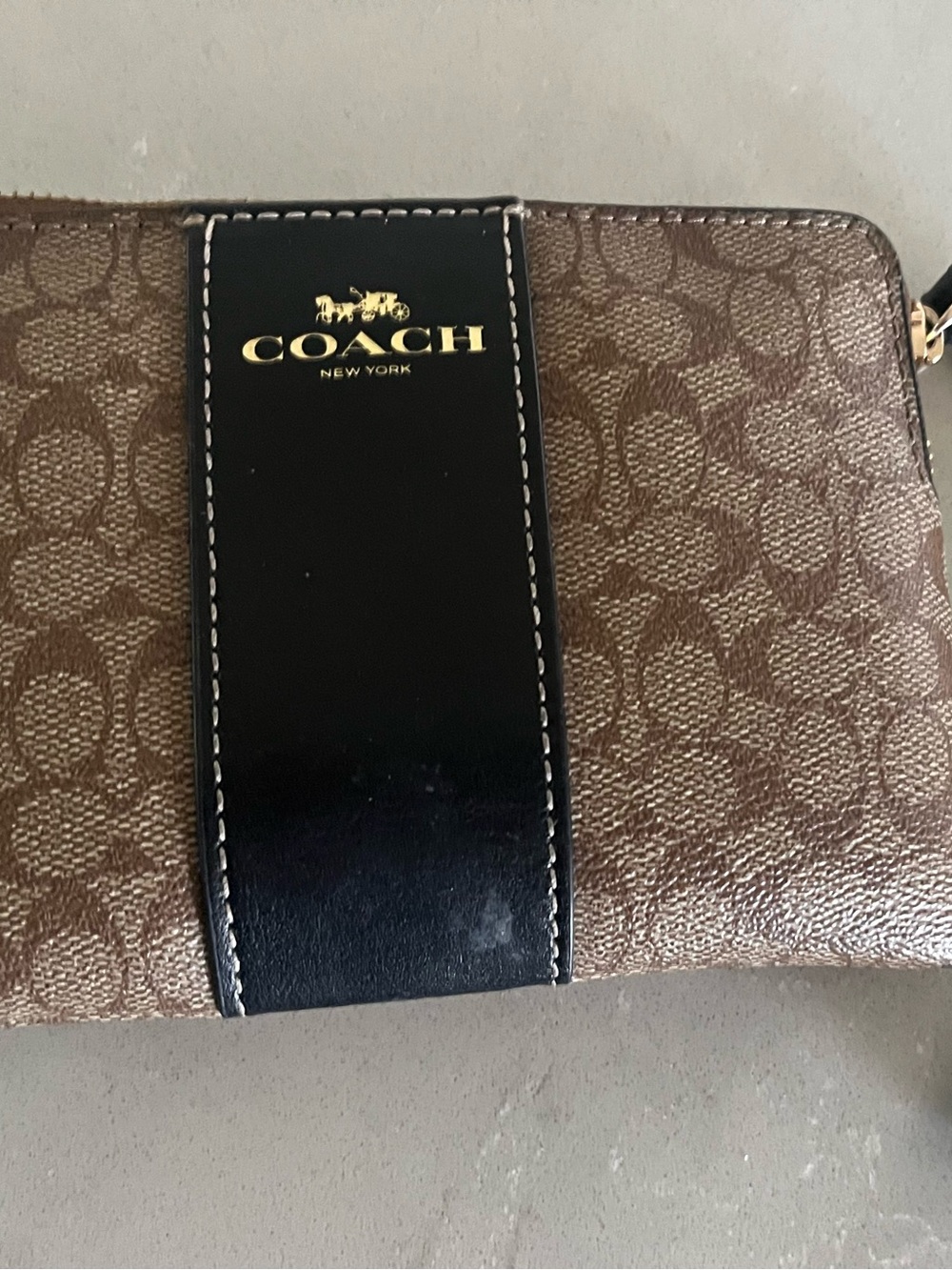 Coach Brown Monogram Wristlet with Black Center Stripe and Gold Logo